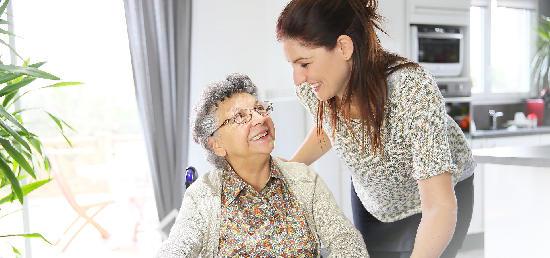 senior woman talking with her daughter