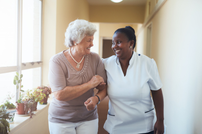 caregiver and senior woman talking